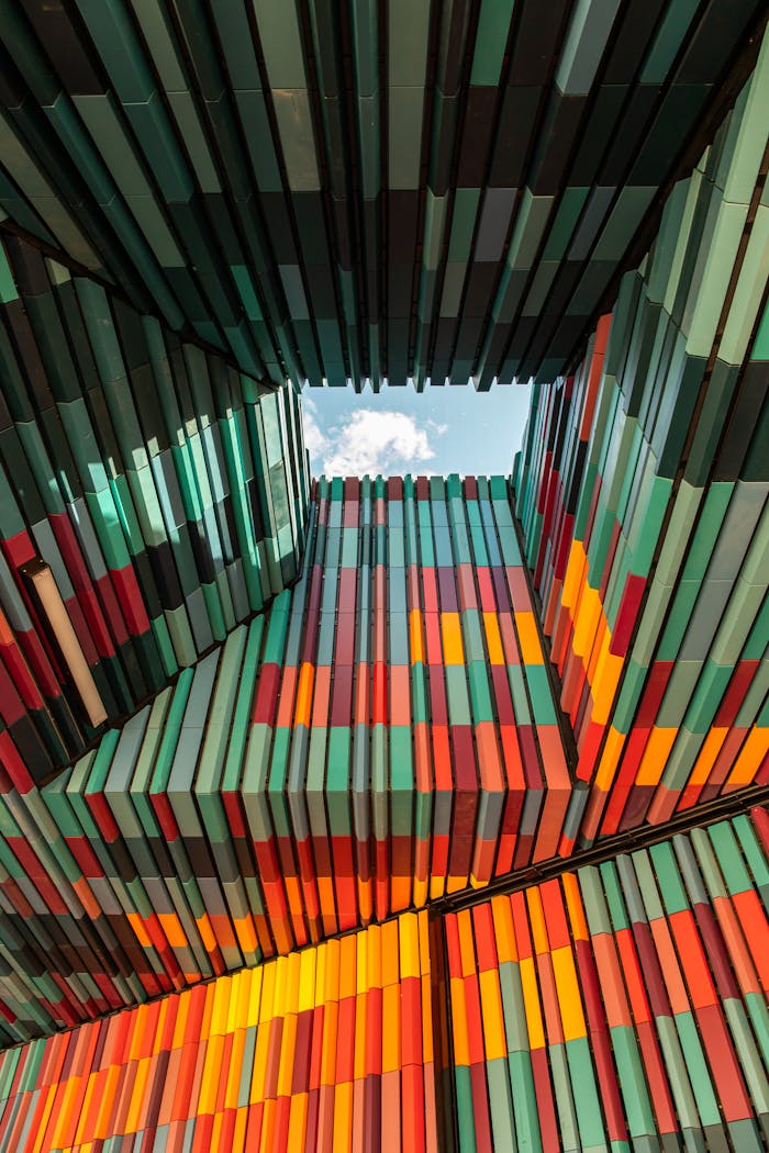 who-we-are Colorful geometric architectural structure in Melbourne featuring vibrant patterns and modern design.